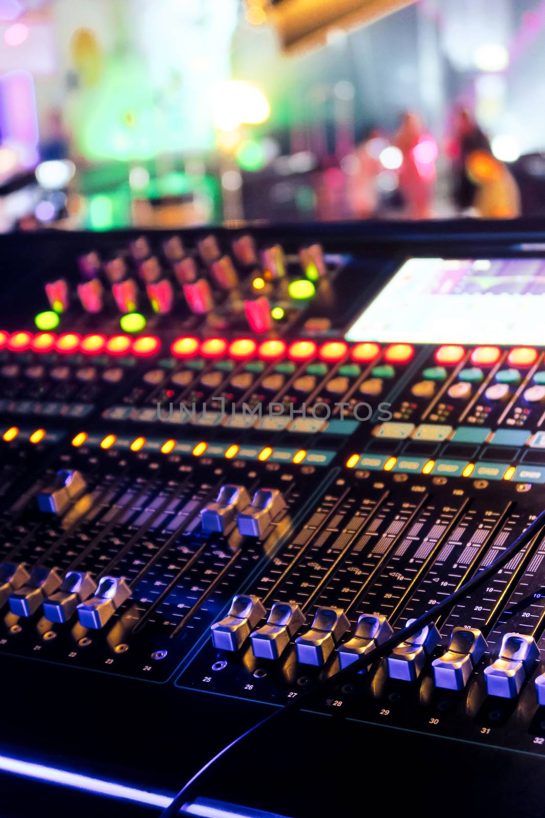 Closeup of an audio mixing control panel