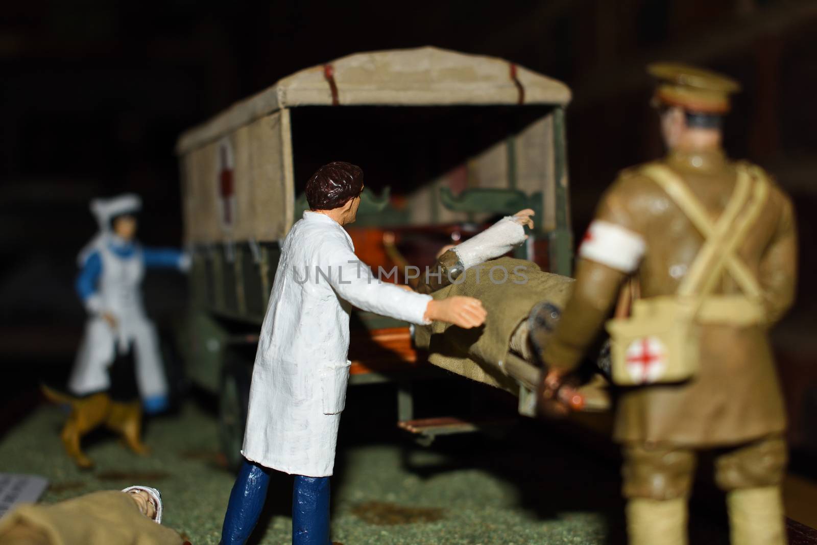 A toy illustration of a medical volunteer corps ambulance and personnel aiding wounded soldiers in a First World War scene