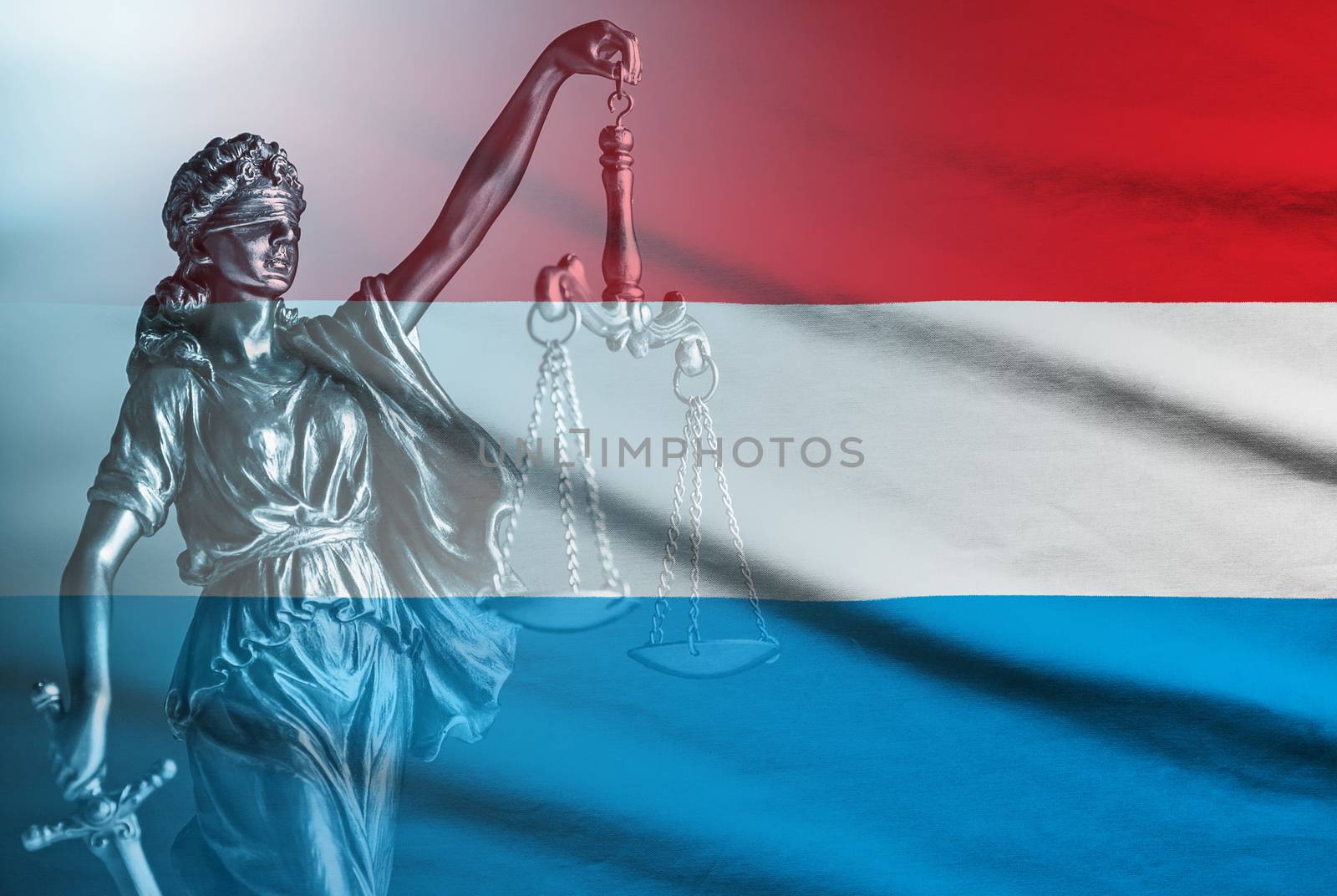 Luxembourg national flag with figure of blindfolded Justice holding scales and sword conceptual of law and impartiality
