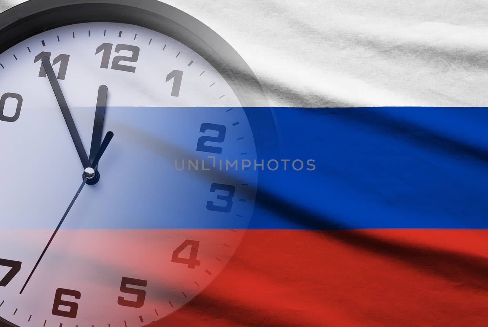 Composite of the Russian flag and a clock face showing a countdown to twelve in a full frame view