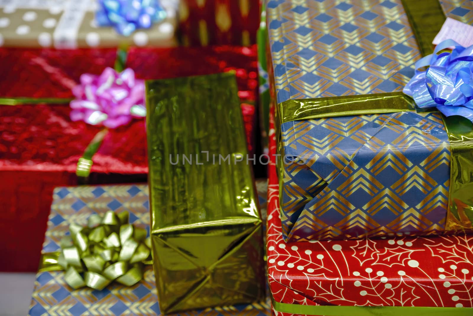 Red, gold, yellow holiday gift boxes. Beautifully designed gifts for friends and family.