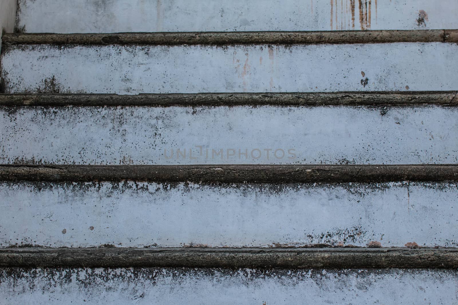 Abstract background of Old Concrete stairs.  concrete staircase with old dry leaves. by N_u_T