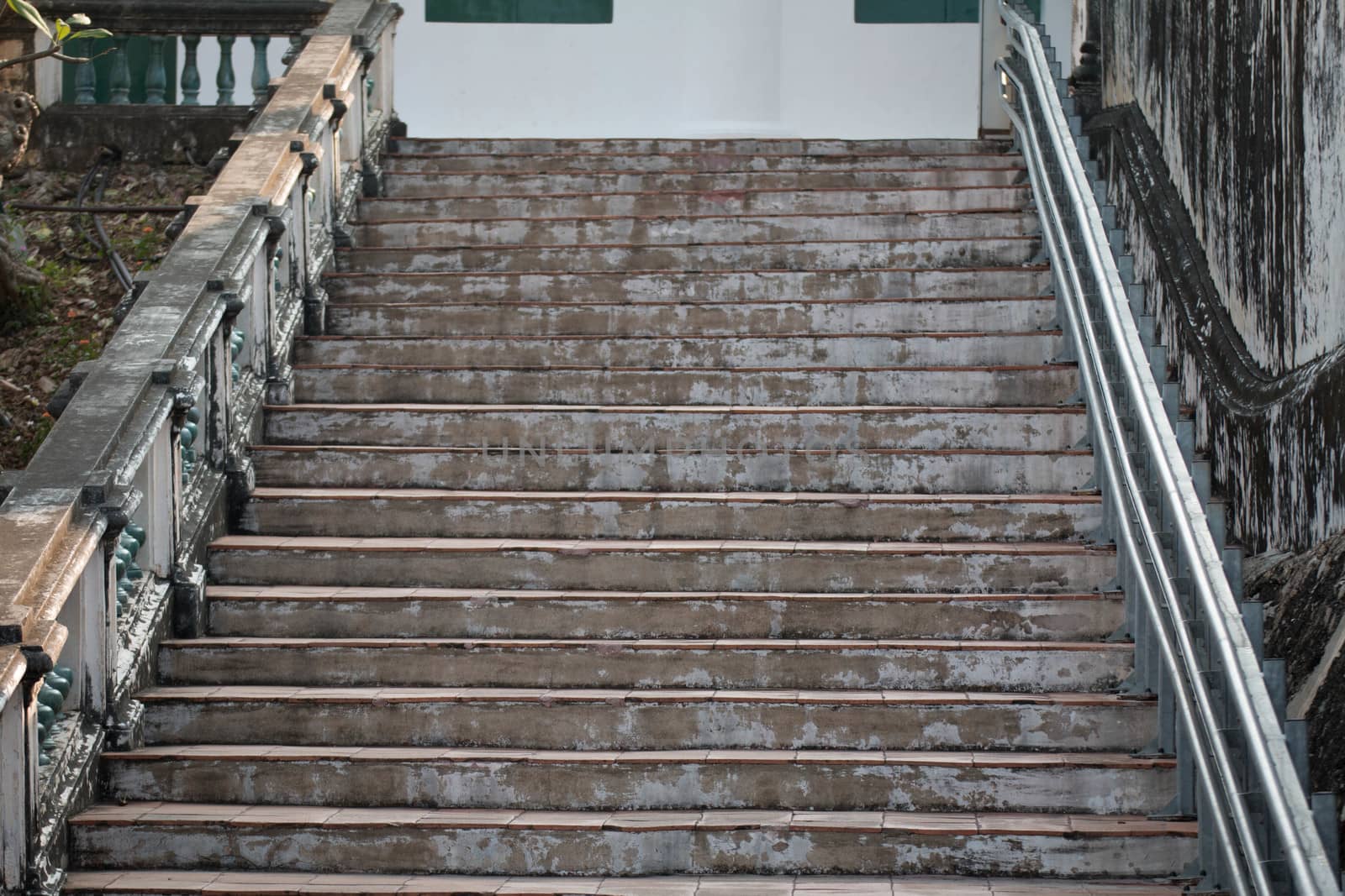 Abstract background of Old Concrete stairs.  concrete staircase with old dry leaves.