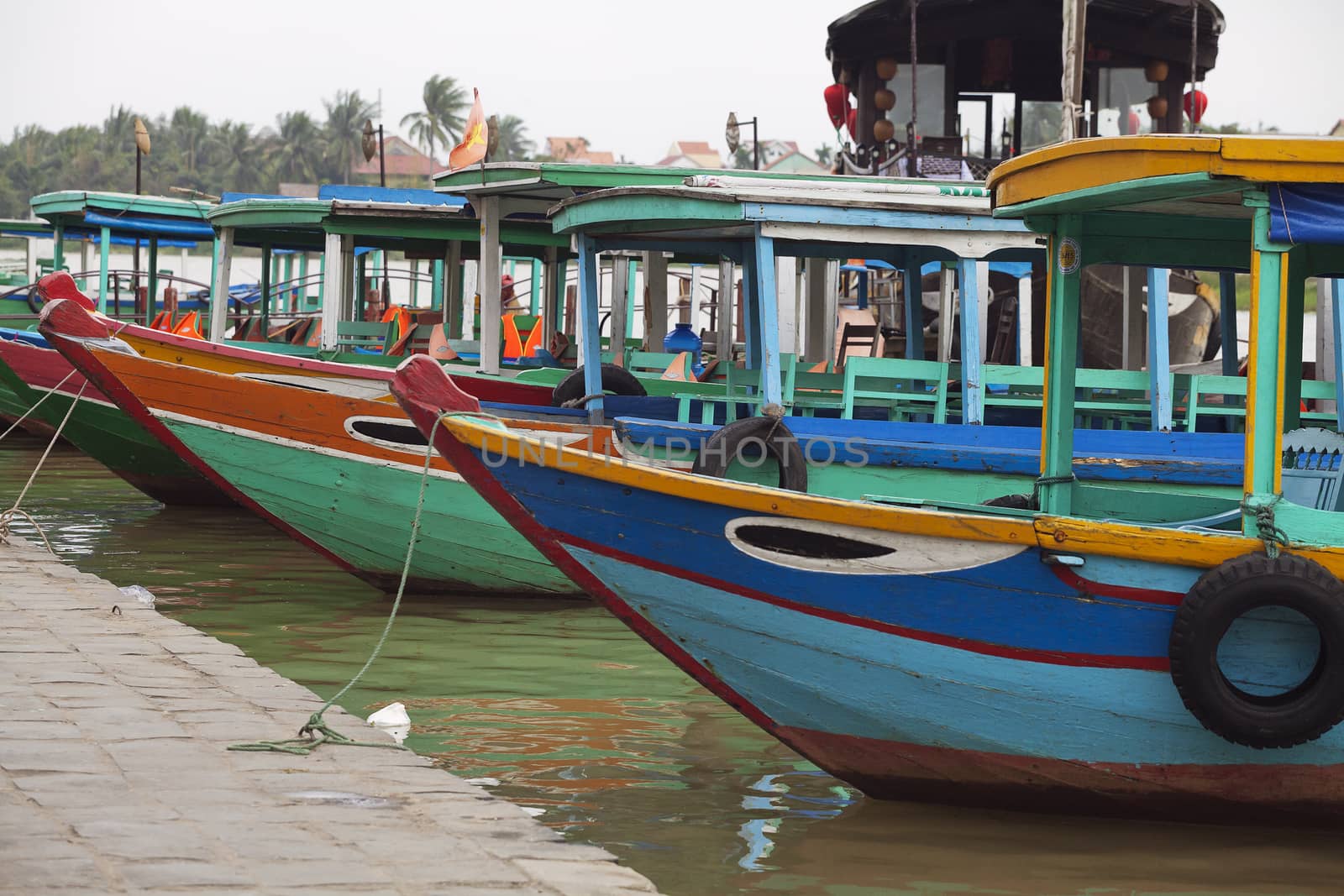 Colorful boats in Hoi An, Vietnam by Goodday