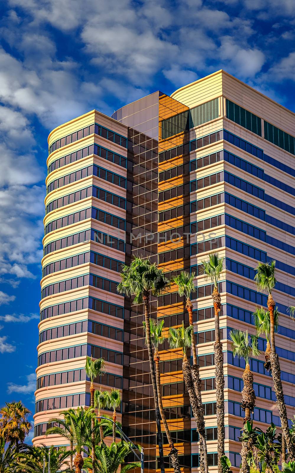 Colorful Tropical Condo Tower against nice sky in Long Beach