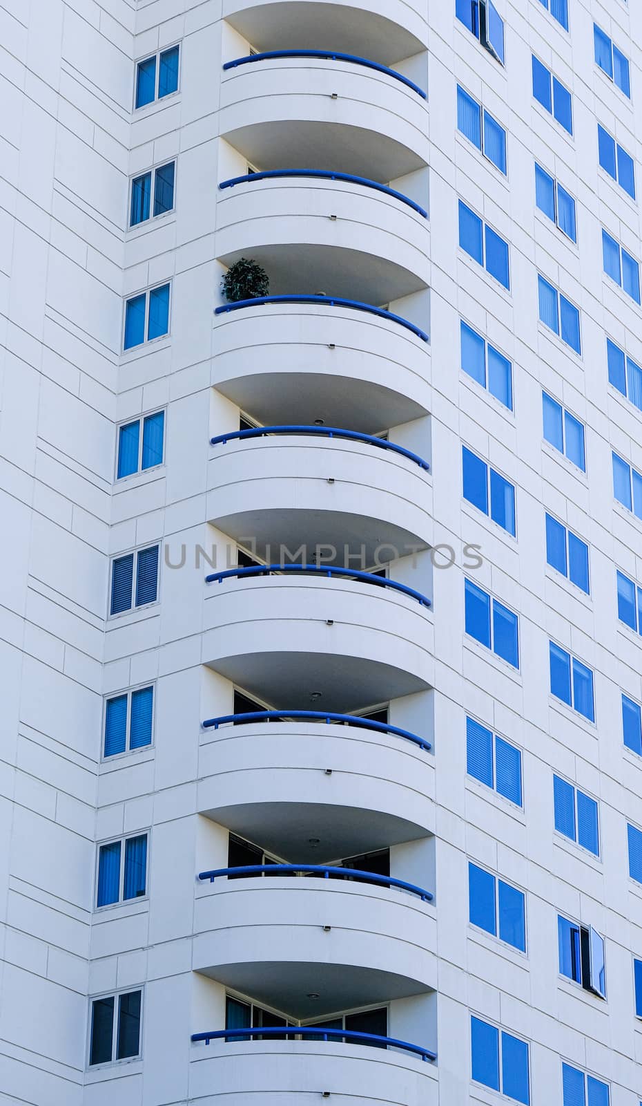 Curved Balconies on White Stone Condo Tower in Long Beac