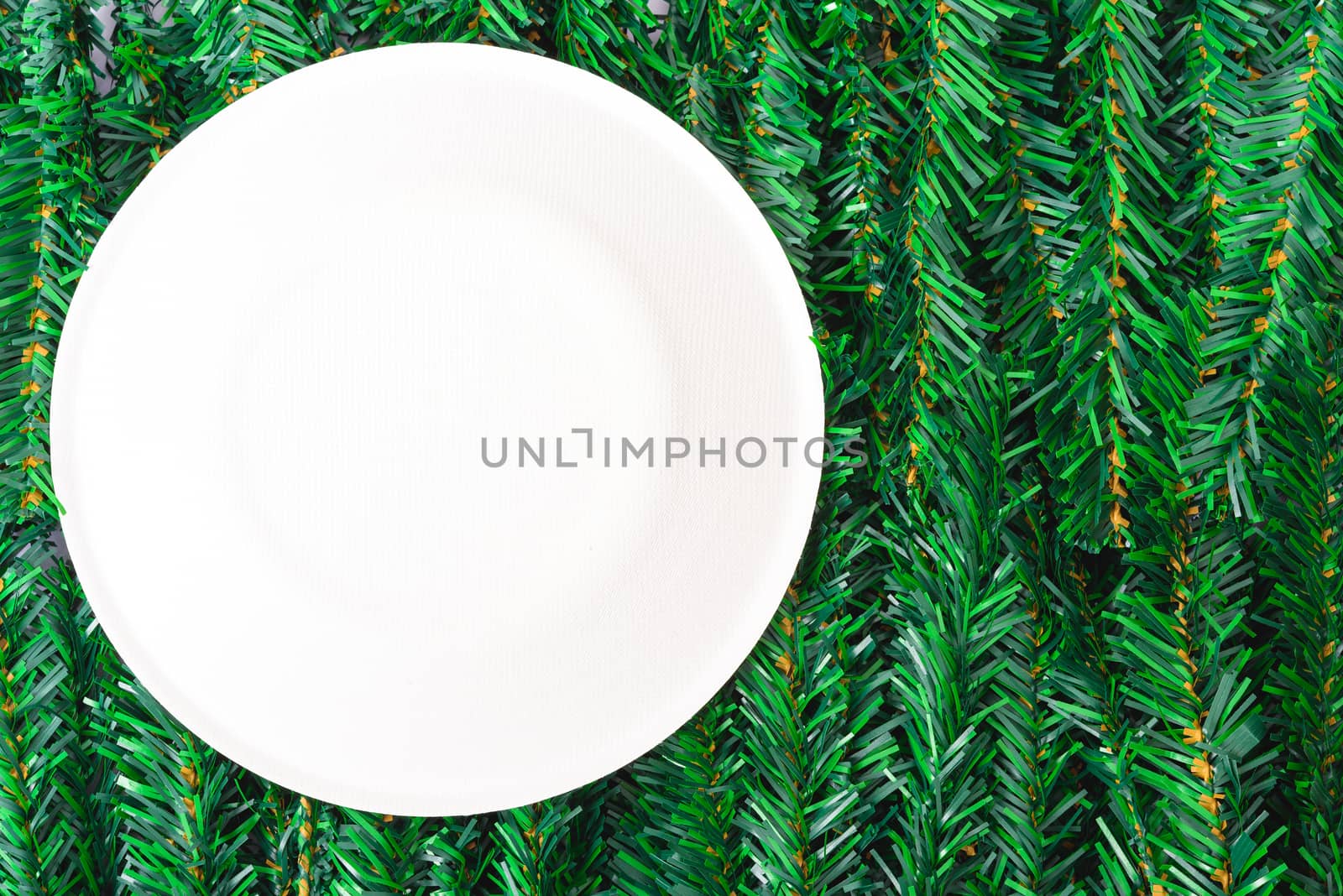 Happy New Year and Christmas day, top view flat lay composition decoration branches tree, white round on white background with copy space for your text