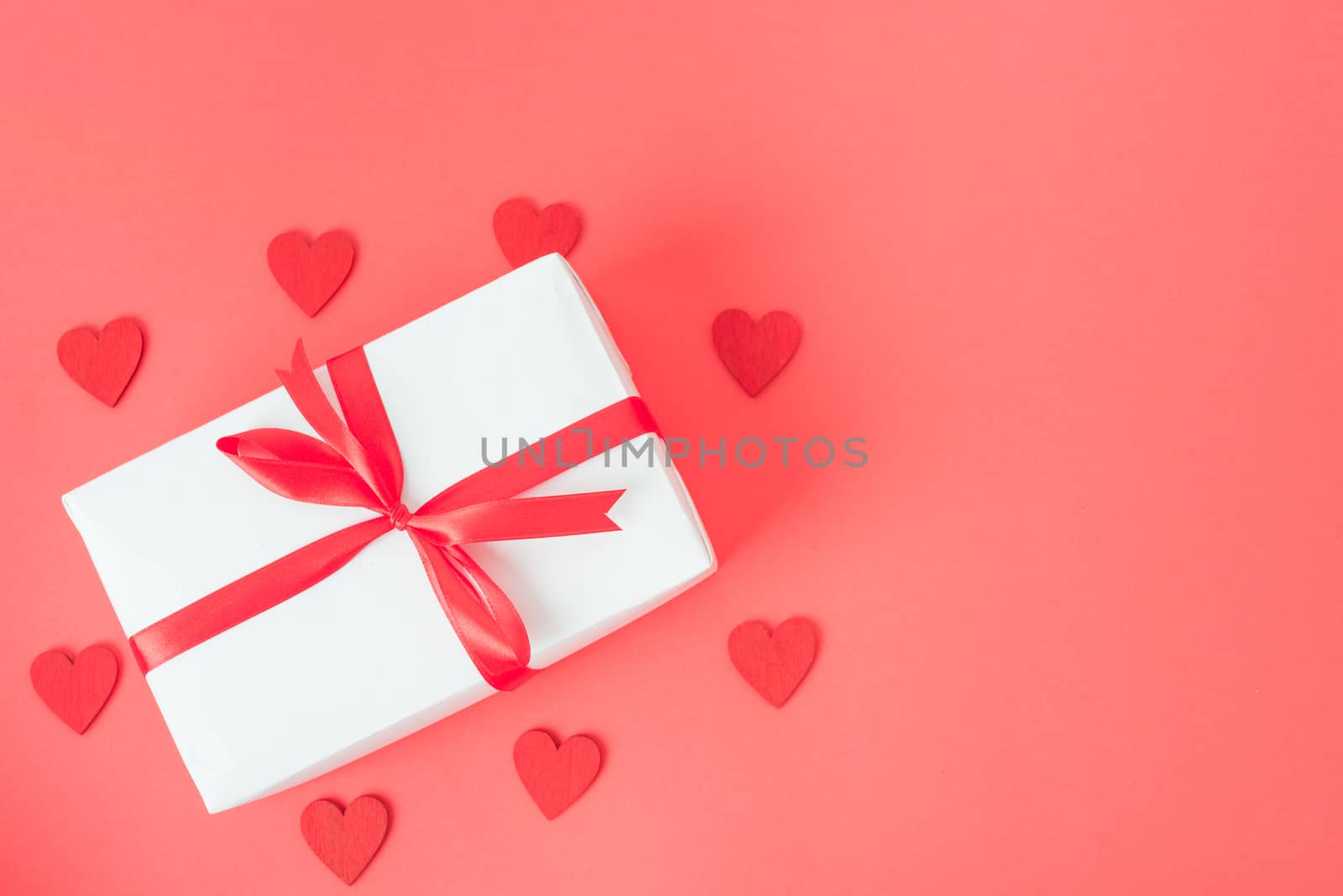 Valentine's Day background, Top view Flat lay Red heart round frame gift box on red background. Valentines day concept with copy space