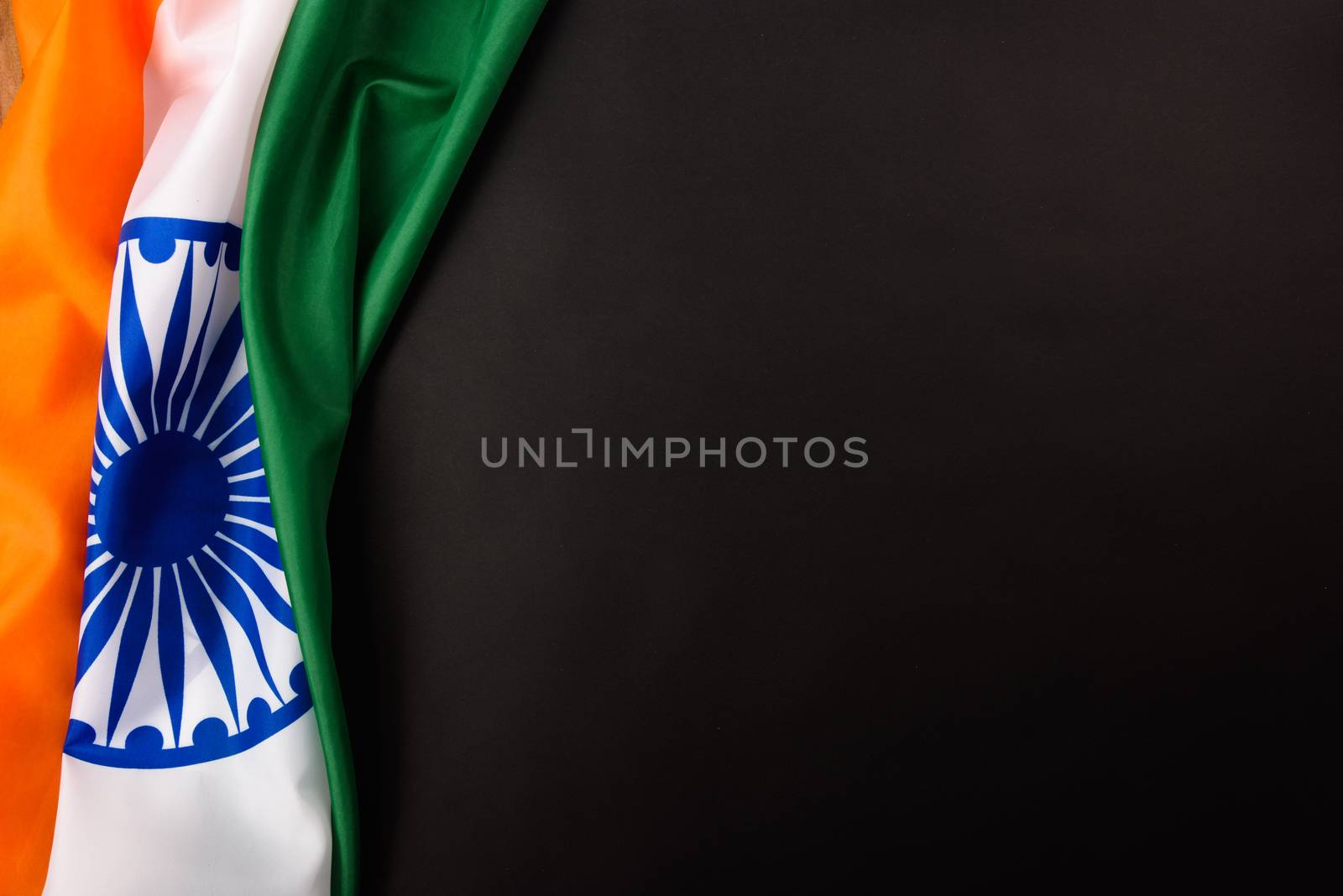 Indian republic day, flat lay top view, Indian flag on black background with copy space for your text