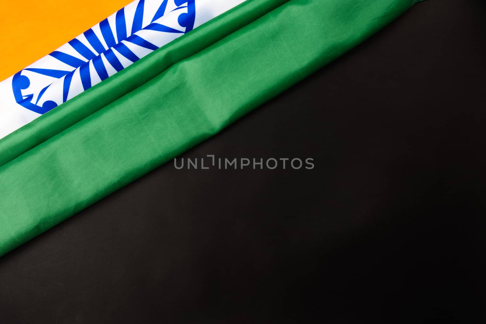 Indian republic day, flat lay top view, Indian flag on black background with copy space for your text