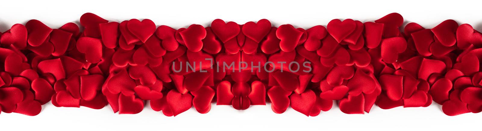 Valentine's day many red silk hearts stripe isolated on white background, love concept