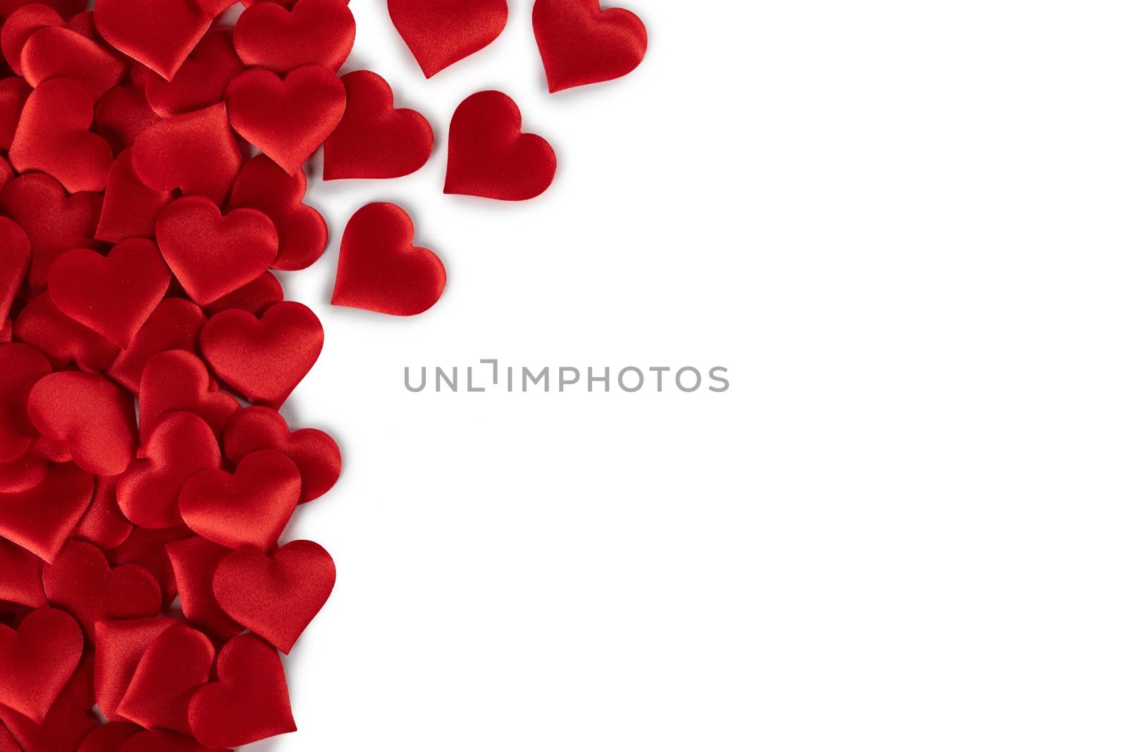 Valentine's day many red silk hearts background , border frame isolated on white with copy space, love concept