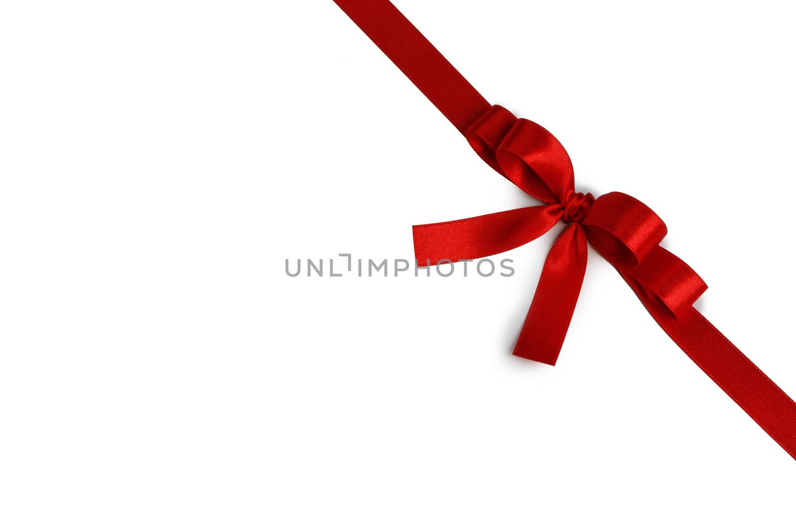 Elegant satin red ribbon bow isolated on white background