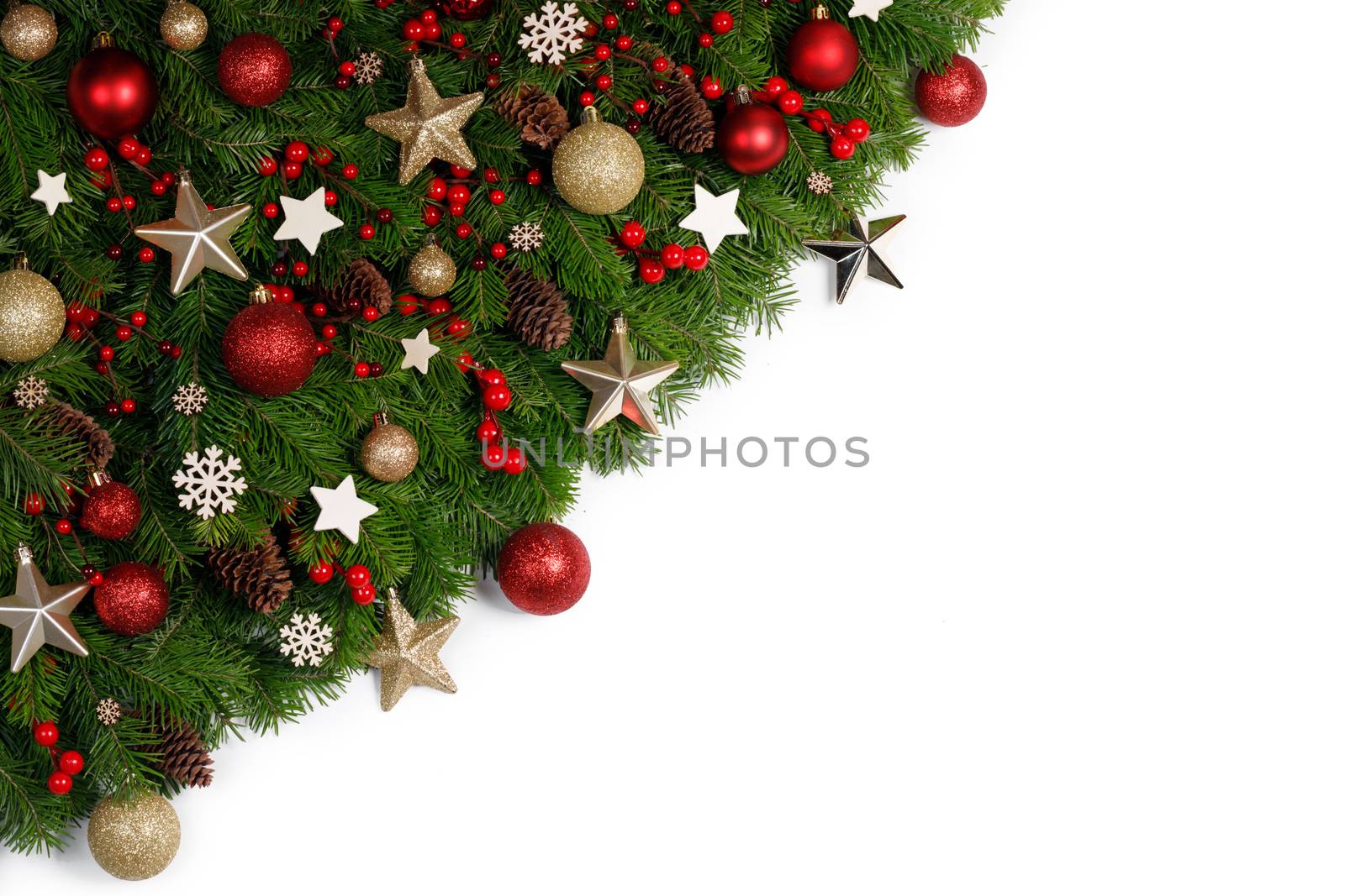 Christmas New year decoration frame isolated on white , fir tree branches , red and golden baubles and pine cones , wooden decor , red berries , copy space for text
