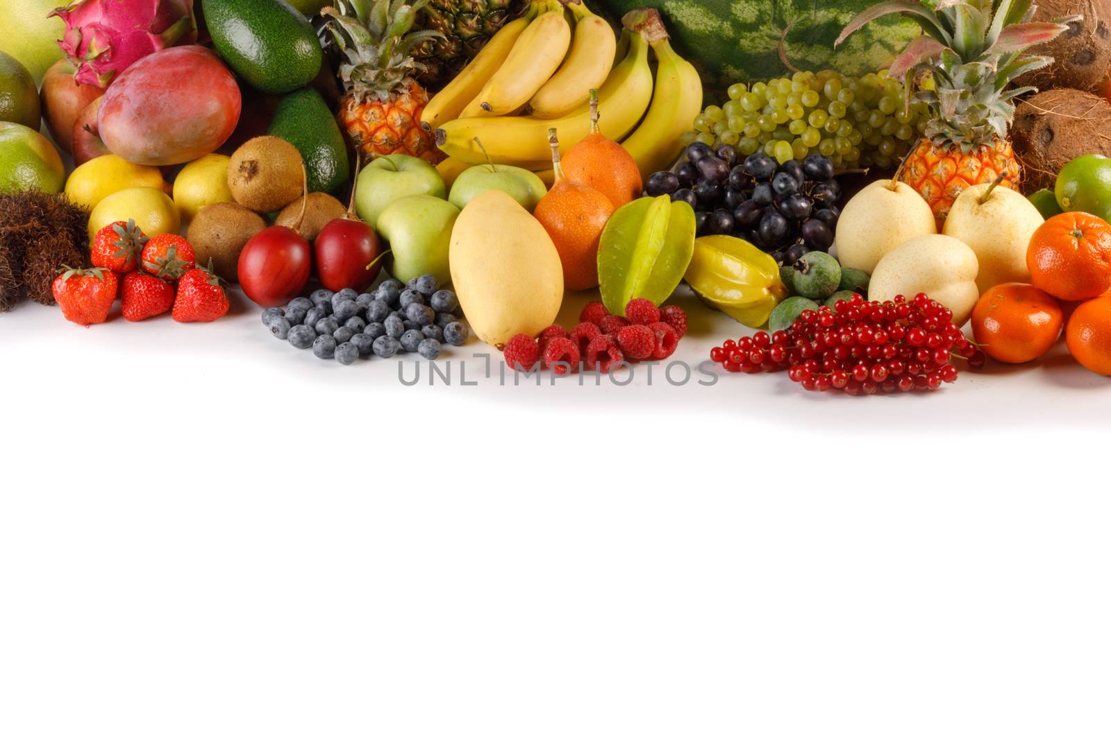 Fresh tropical fruits harvest pile isolated on white background with copy space for text