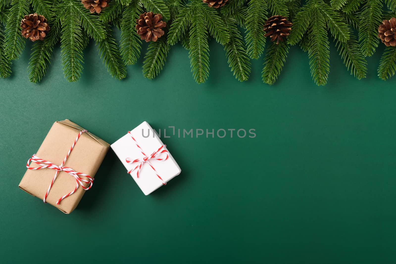 Happy new year, christmas day concept top view flat lay fir tree branches, gift box and decoration