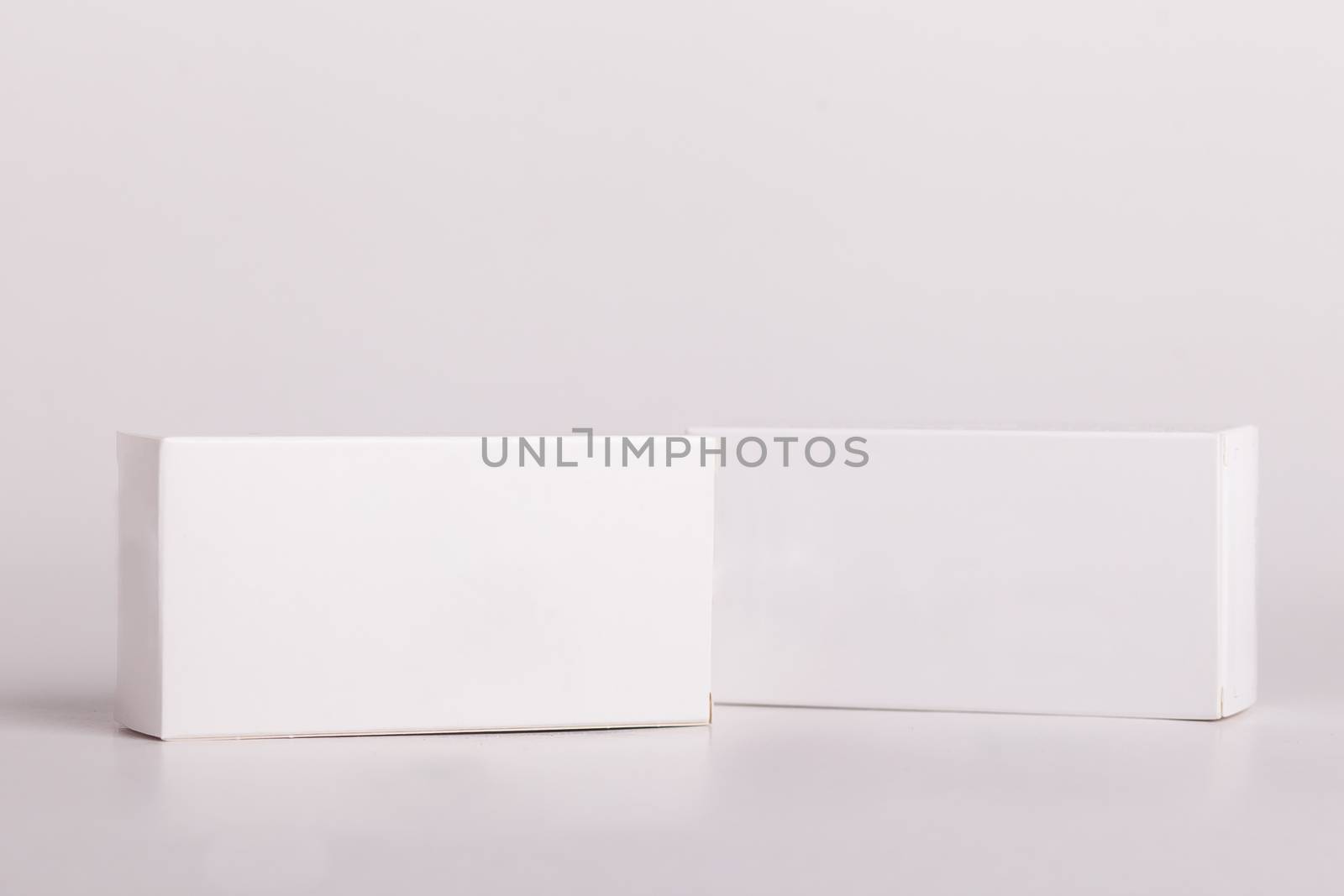 White pills box. Plastic bottles. Drugs box mock-up. Medical blank cardboard. Pills bottle. Mockup.