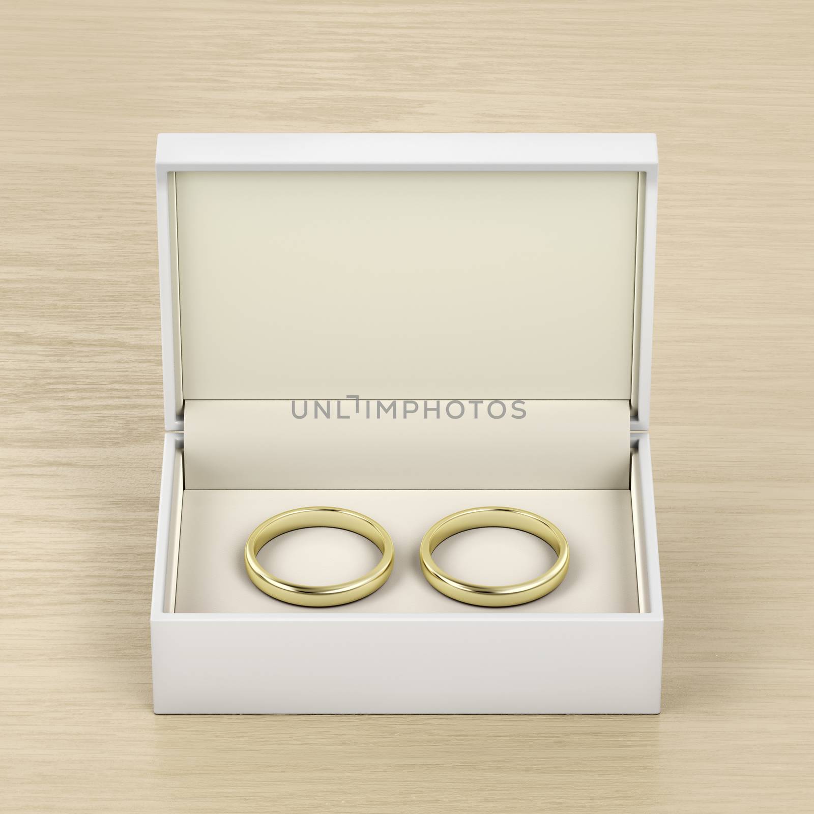 Box with gold wedding rings by magraphics
