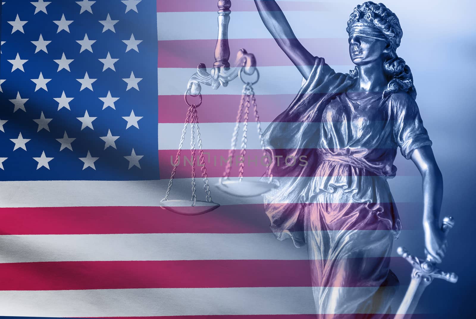 Composite image of Justice holding scales and a sword over the Stars and Stripes USA flag