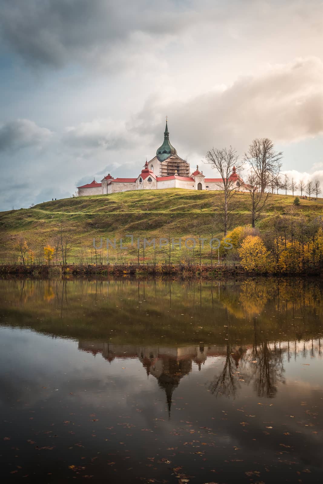 The pilgrimag church on Zelena Hora - Green Hill - Monument UNESCO. St. Jan Nepomucky Church panorama in autumn scene with reflection in the lake water. by petrsvoboda91