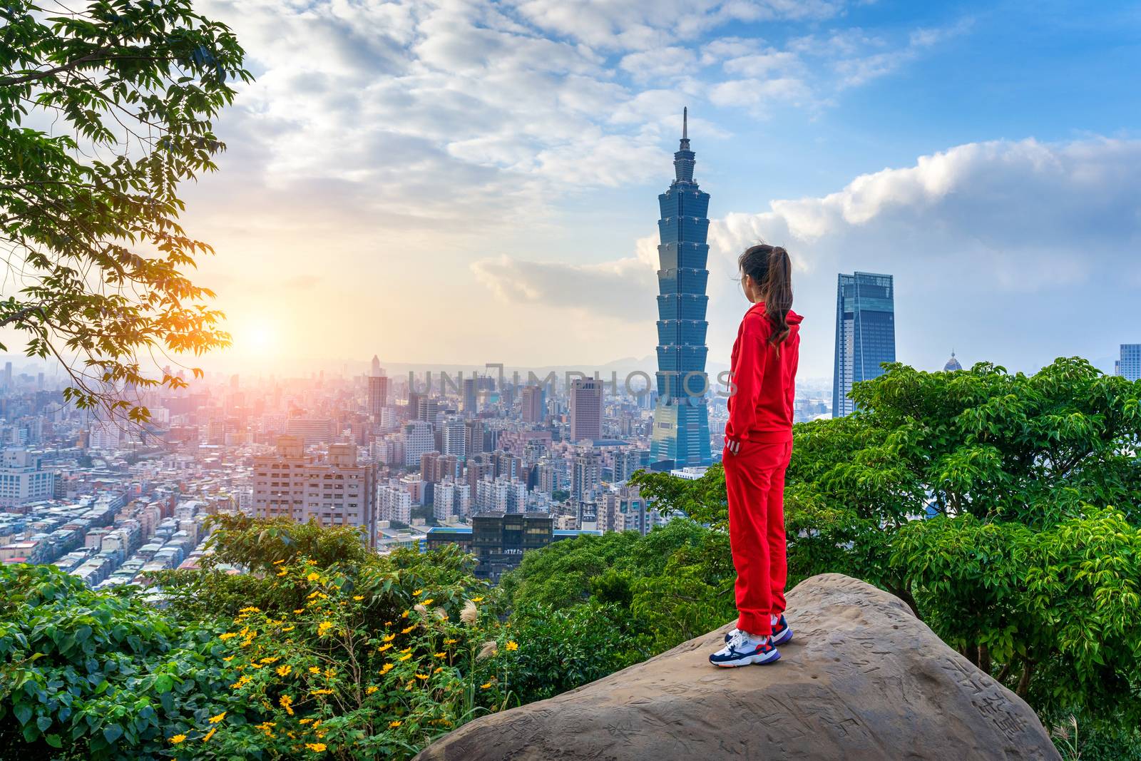 Tourist woman enjoying view on mountains in Taipei, Taiwan.