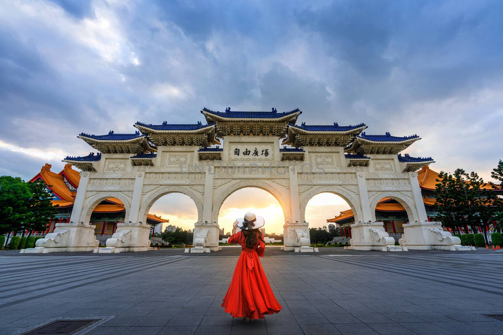 Woman walking at Archway of Chiang Kai Shek Memorial Hall in Taipei, Taiwan. by gutarphotoghaphy