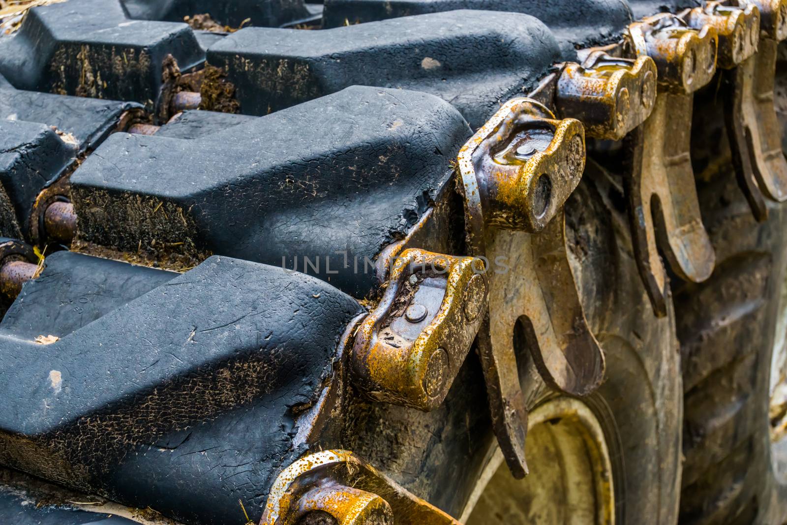 details of a caterpillar tire in closeup, construction equipment, earthmoving industry background