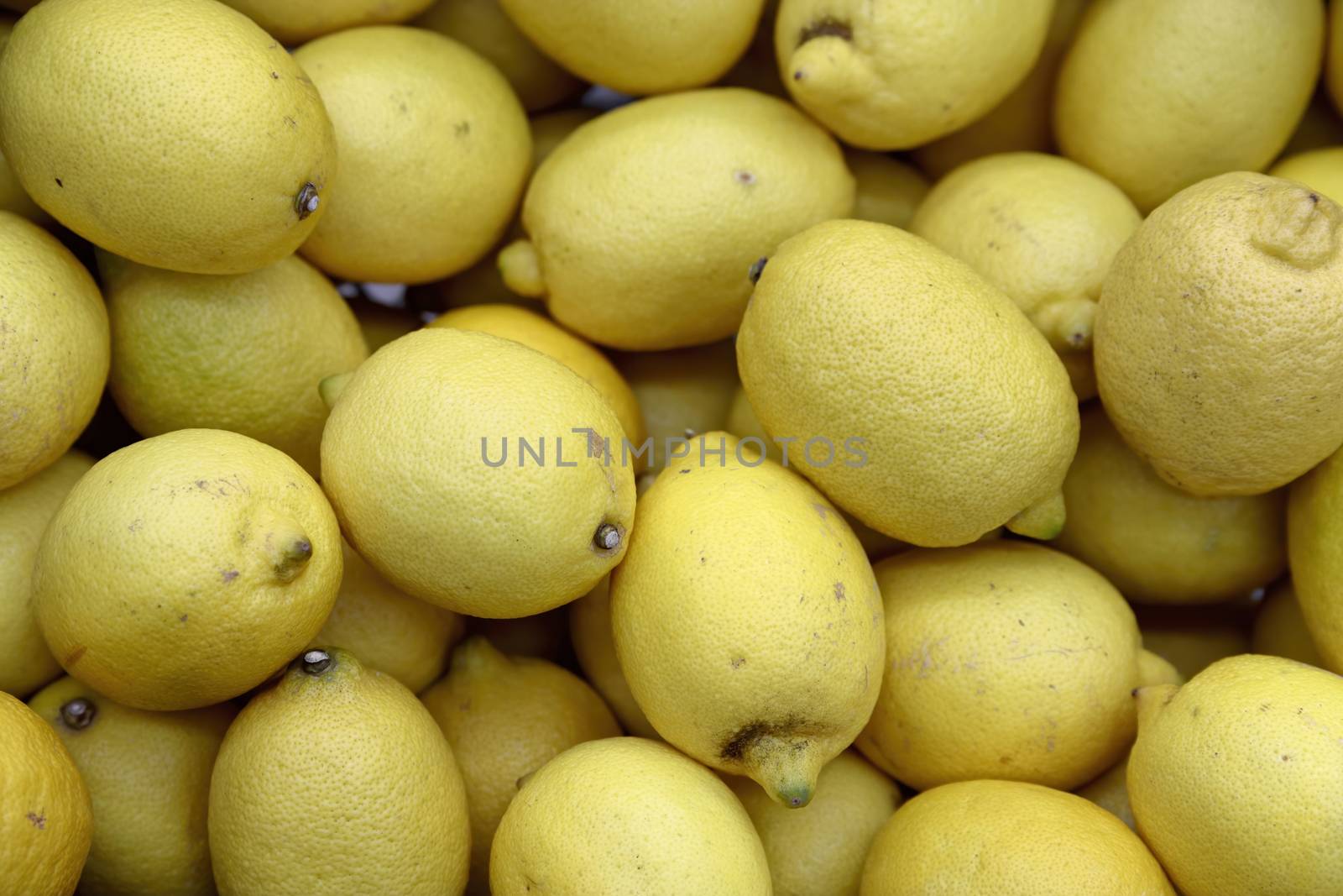 Colorful Display Of Lemons In Market by bonilook