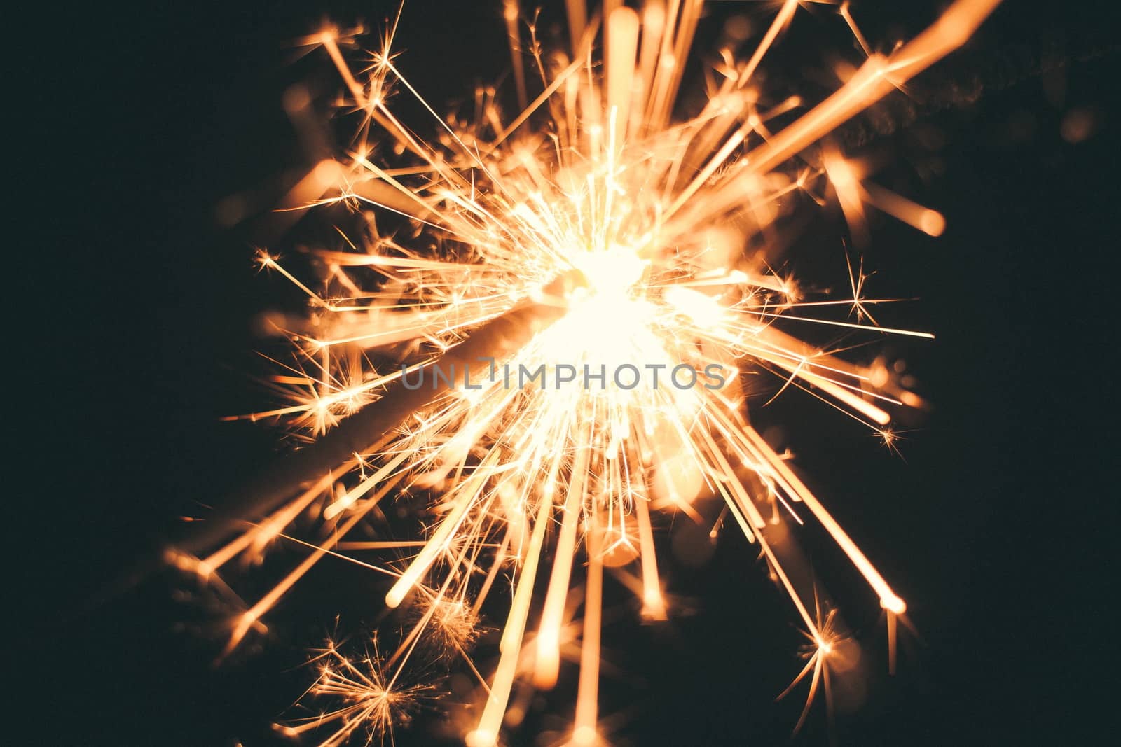 Christmas and newyear party sparkler on black by Roman1030