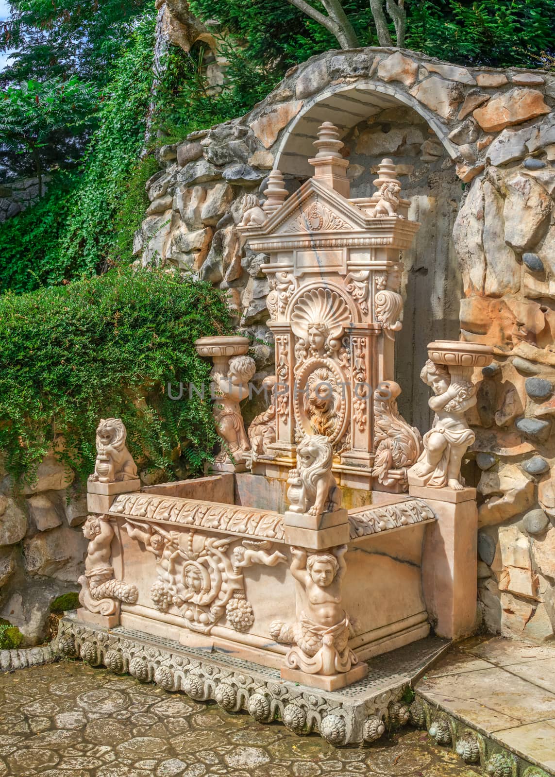 Ravadinovo, Bulgaria – 07.11.2019.  Oriental Garden fountain in the castle In love with the wind in the village of Ravadinovo, Bulgaria, on a sunny summer day