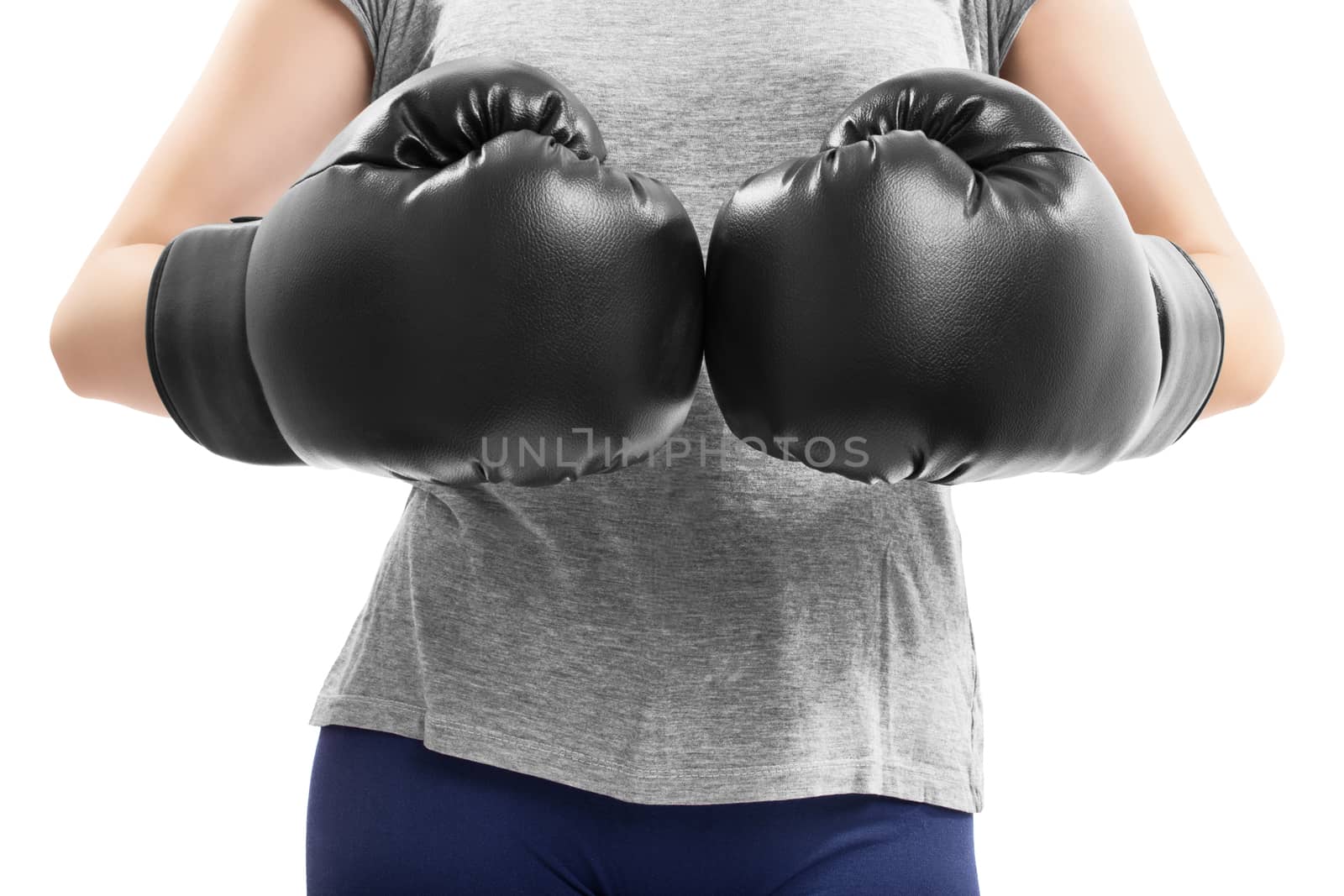 Close up shot of a fit sporty girl bumping fists in boxing gloves, isolated on white background.