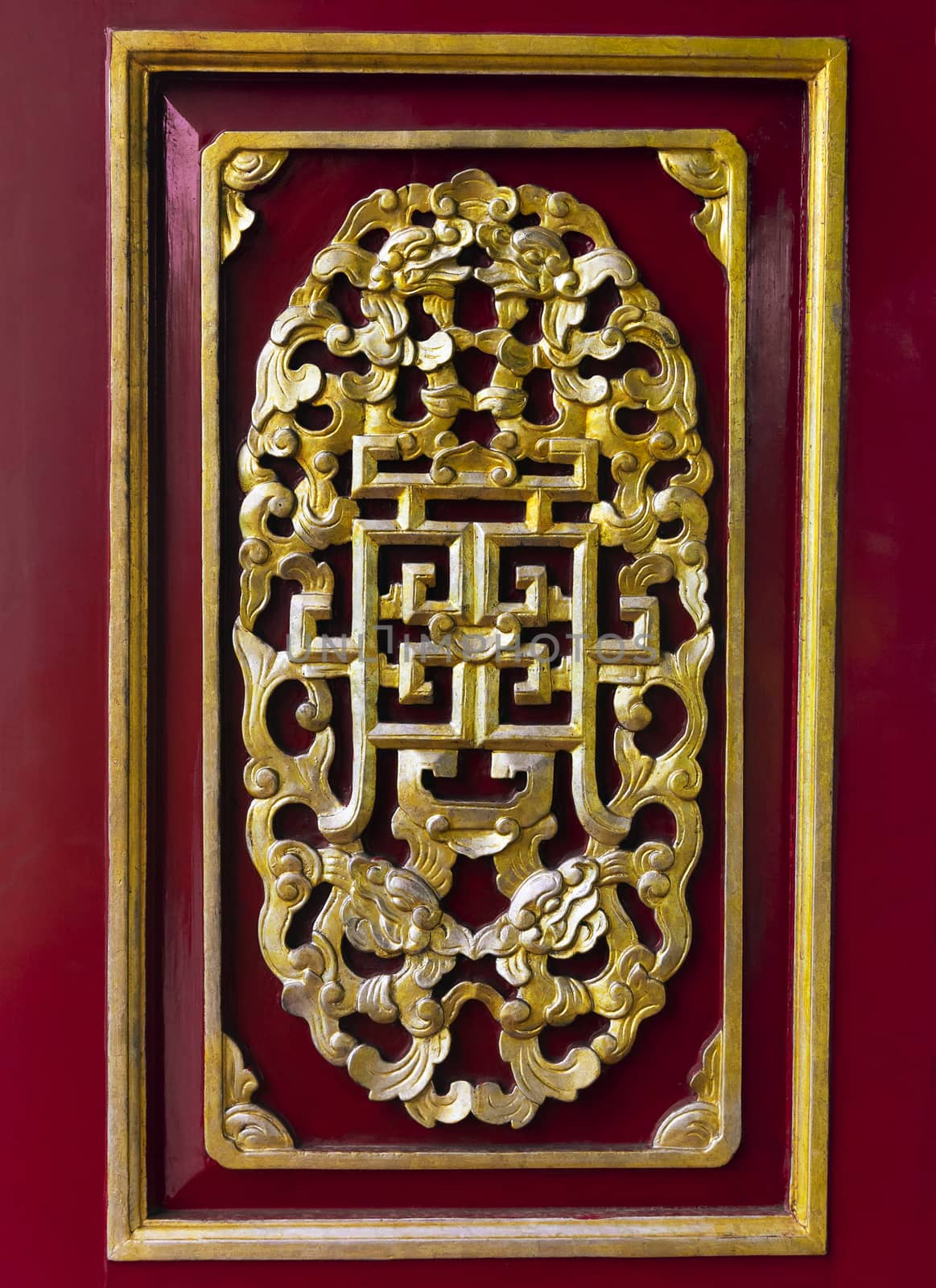 Gold and red ornament in Imperial Palace in Hue, Vietnam