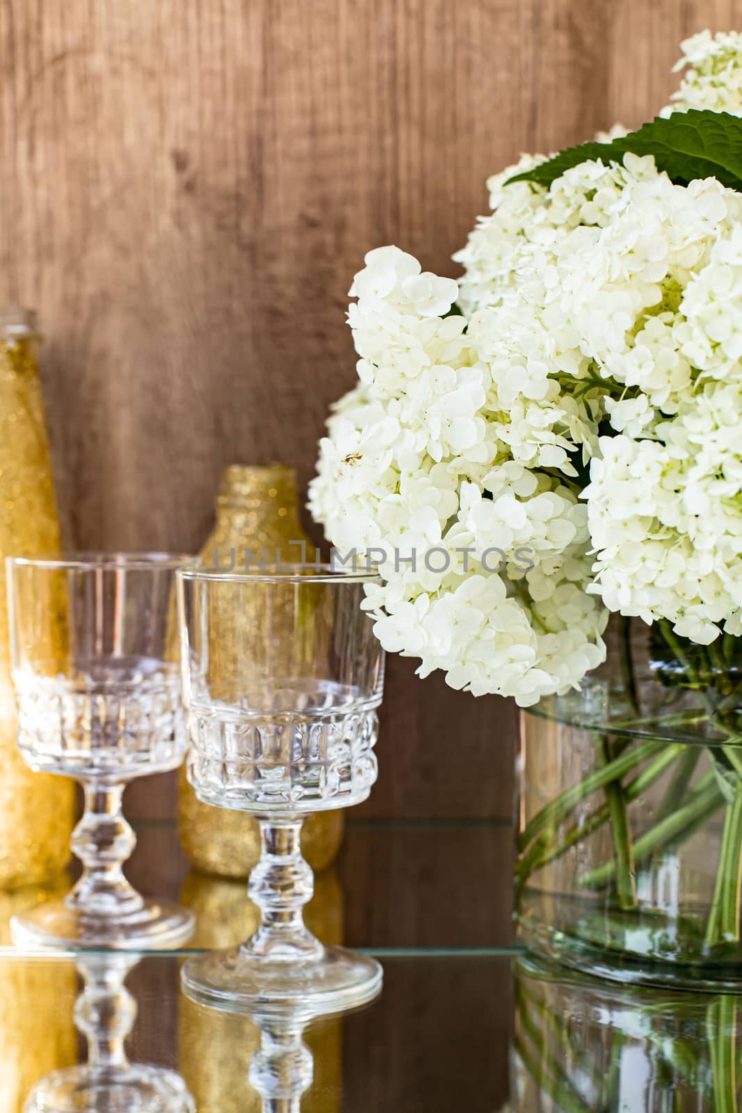 Rose blush wine in glasses. Bottle of rose wine with flowers on background. Prosecco. by Denys_N