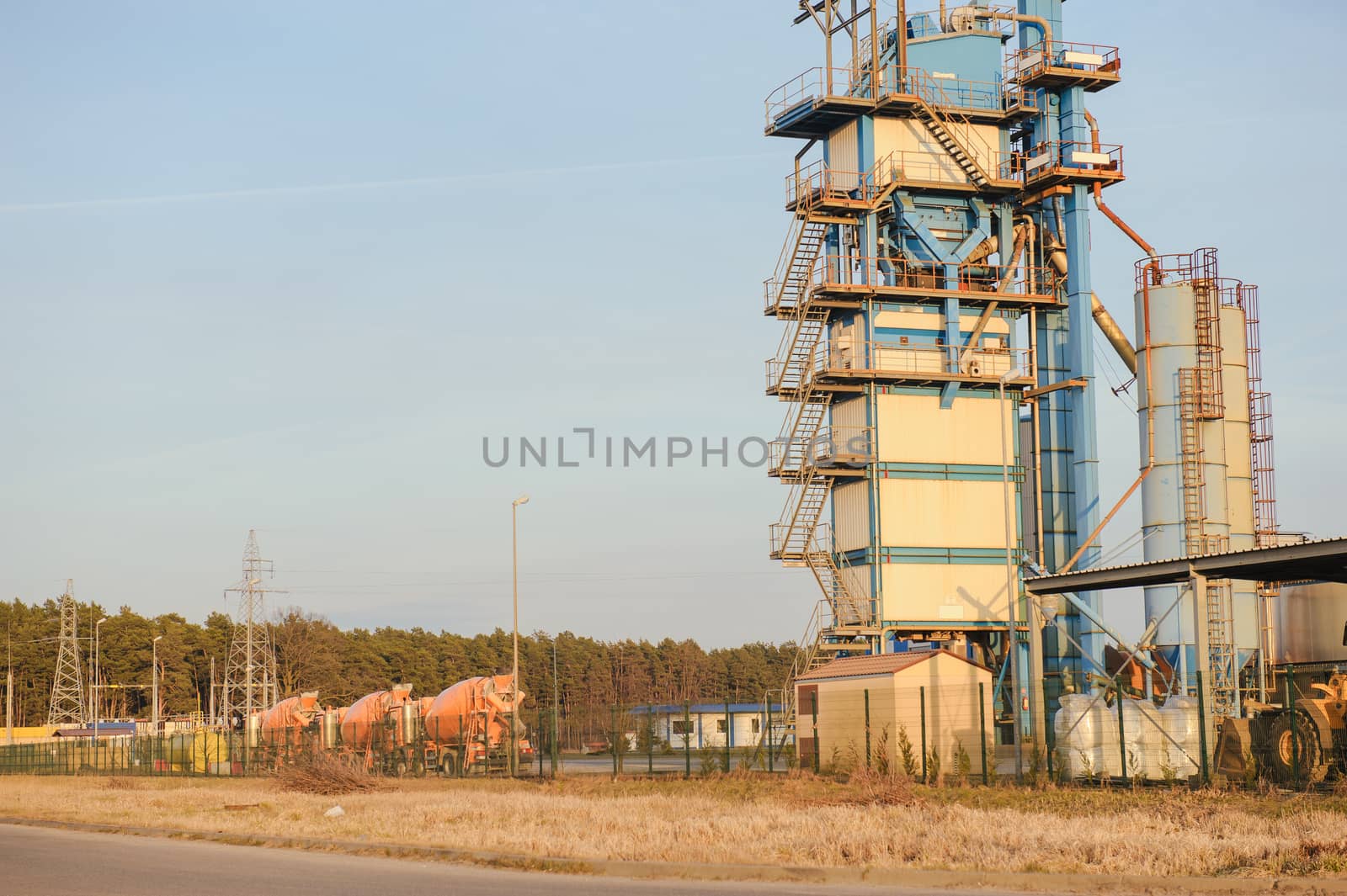 Modern industrial exterior building over blue sky