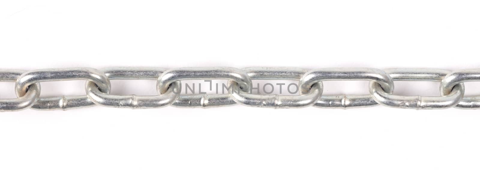 Long silver colored chain isolated on white