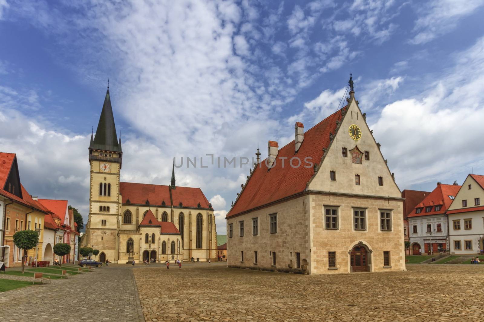 St. Egidius Basilica and city hall in old town square in Bardejov by day, Slovakia