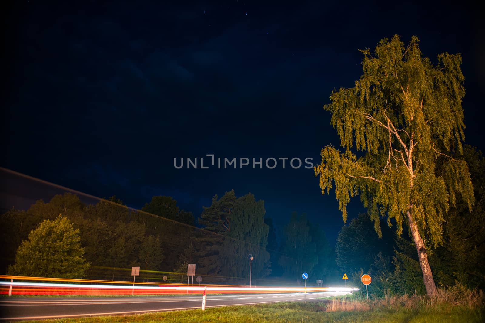 Speed Traffic - light trails on motorway highway at night, long exposure