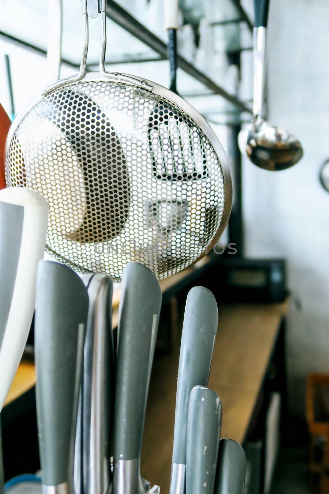 Detail image of kitchen utensils background by ponsulak