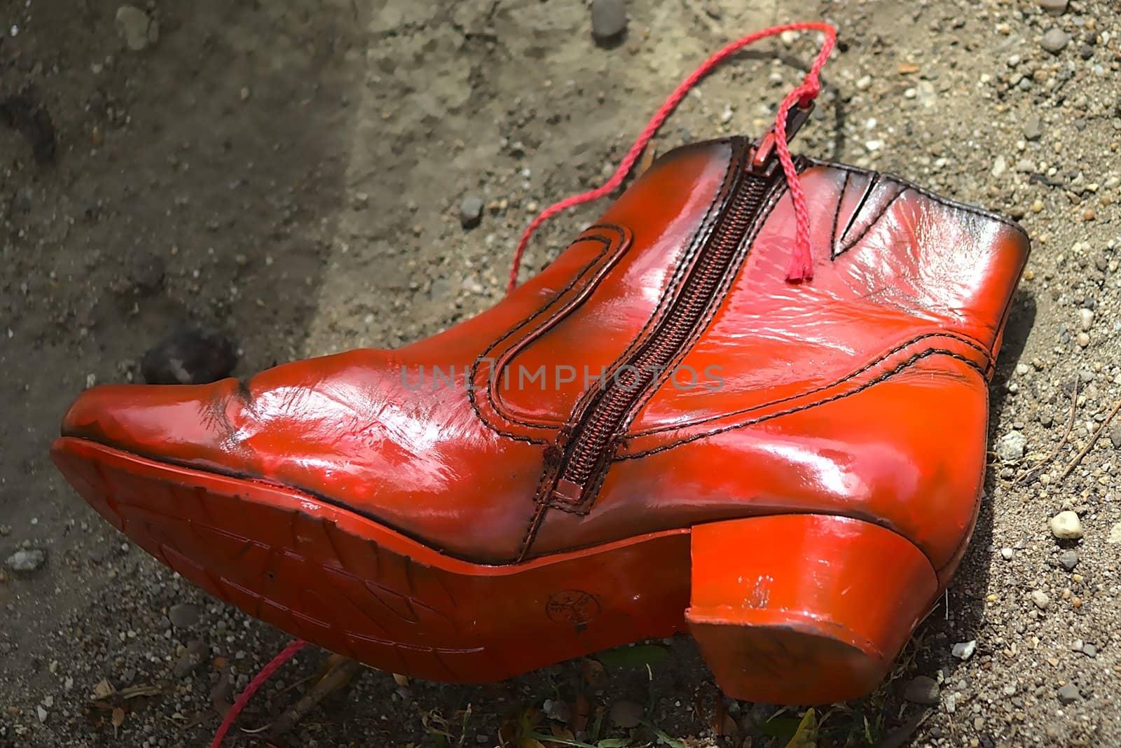 An orange shoe decorating the Limburg Street artist festival 2019 in Roermond, Netherlands