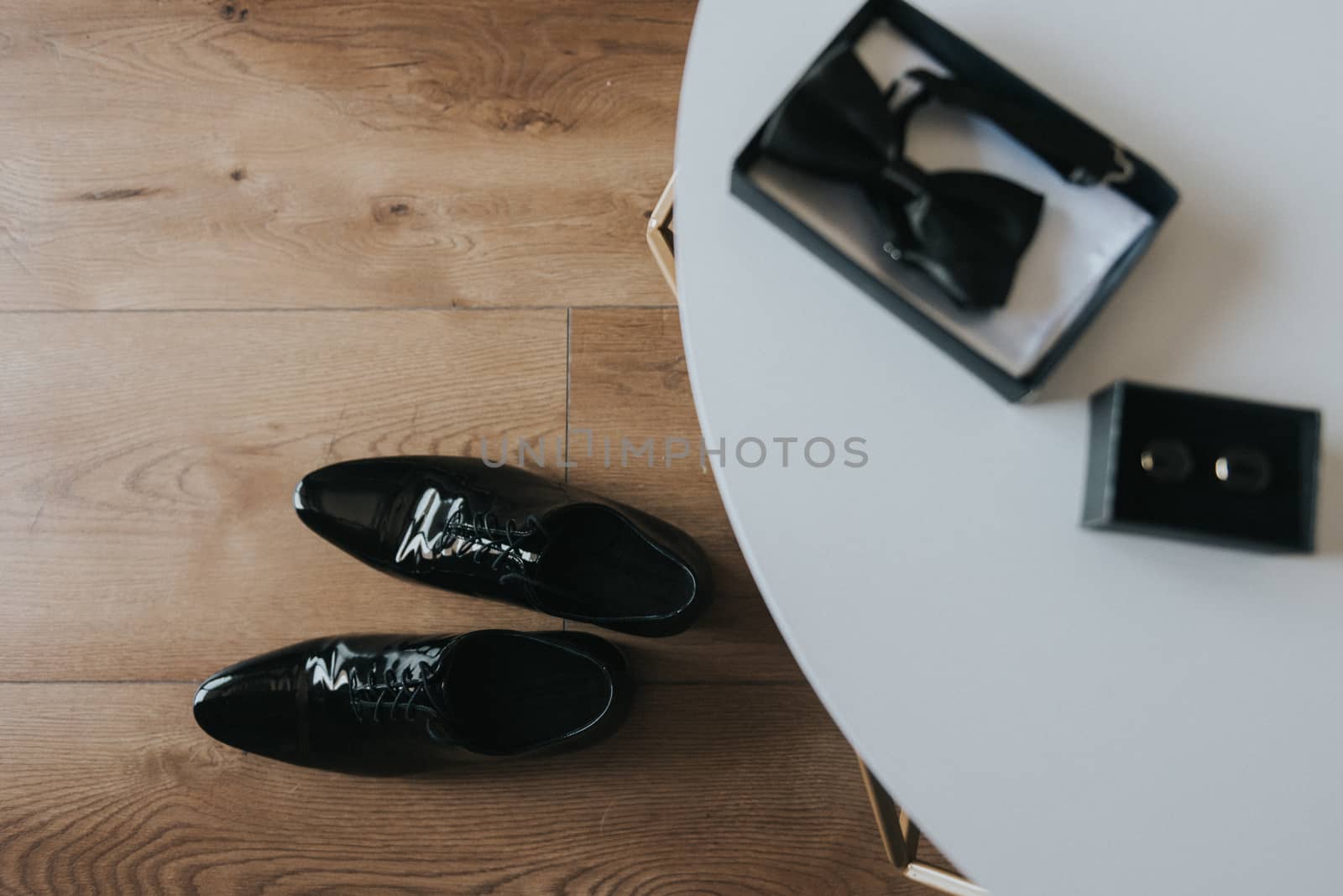 Groom black elegant shoes. Wedding detail. Close up