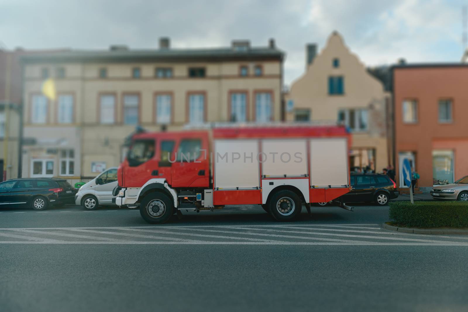 Beautiful wedding couple on outdoor photoshoot with fire truck