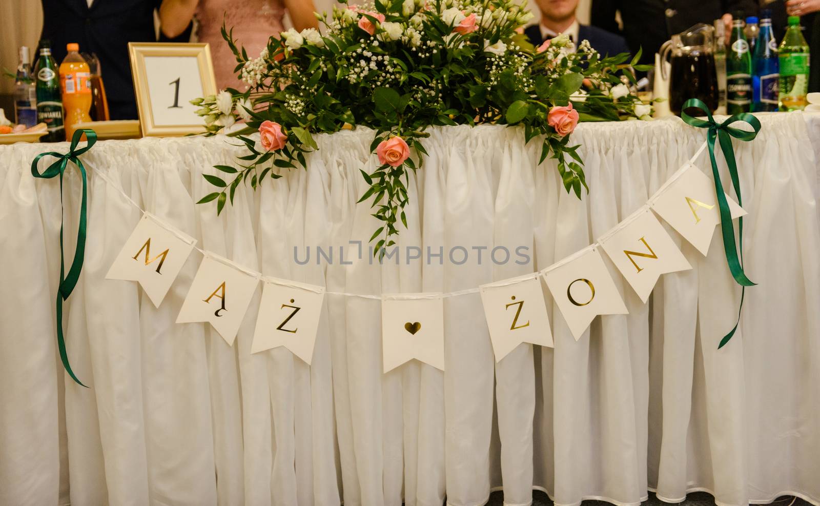 Beautifully decorated wedding table and other details at wedding hall. Wedding day