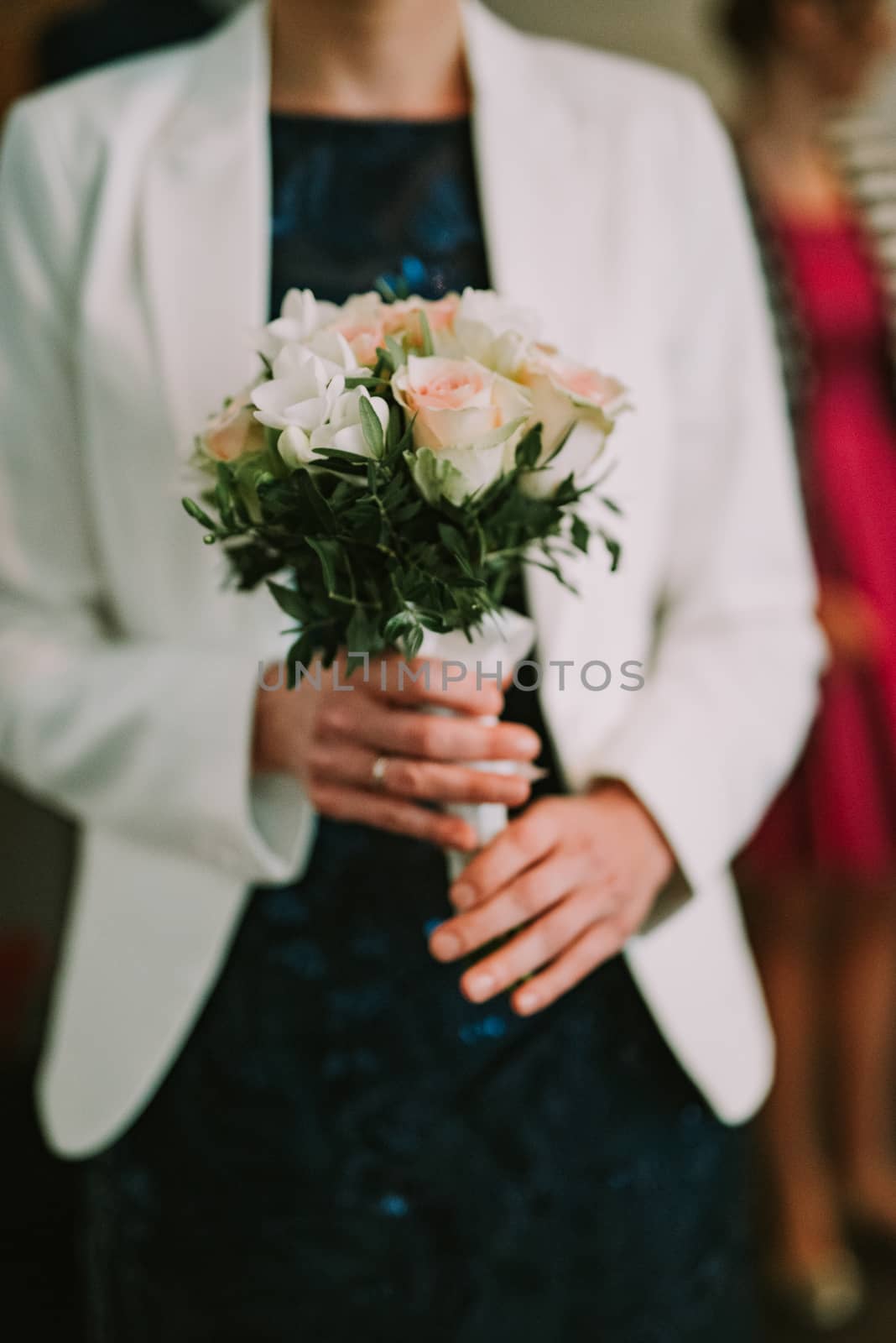 bouquet in the hands of the bride.