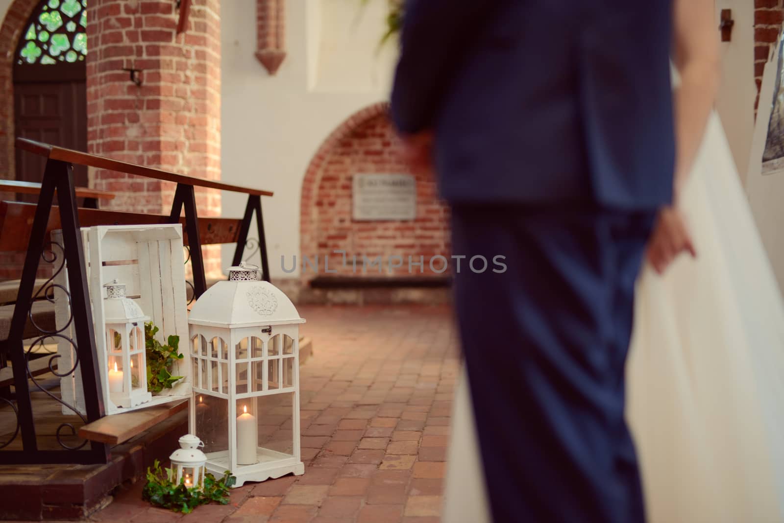 Church sanctuary before a wedding ceremony. Empty chairs for bride and groom