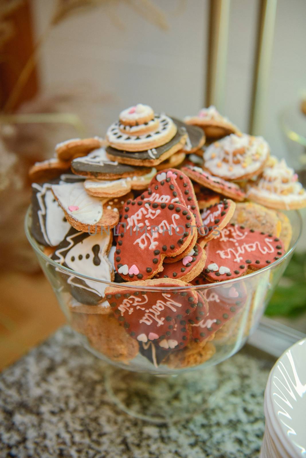Delicious sweets on candy buffet. Wedding bakes on trays.