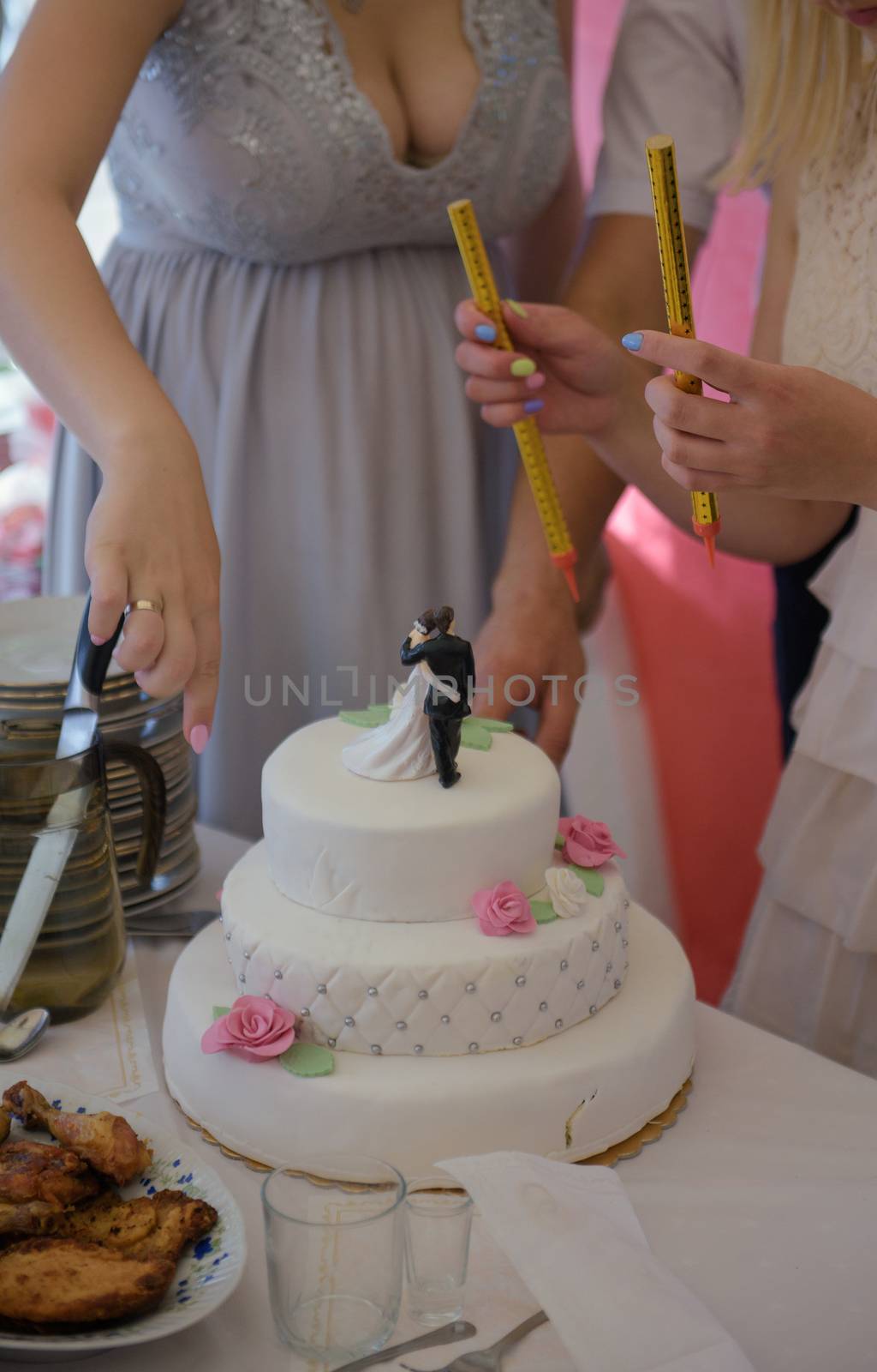 Delicious Wedding Cake at the party. Smoke and fire effects