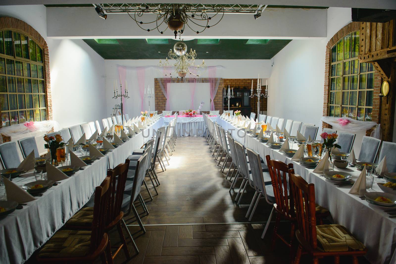 Beautifully decorated wedding table and other details at wedding hall. Wedding day