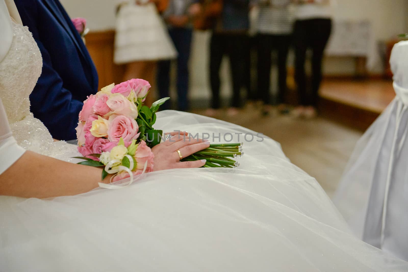 Bride and groom at church wedding during ceremony. Beautiful decoration