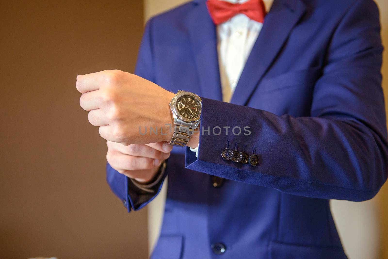 Groom's wedding accessories. Bow tie, suit, cufflinks, belt and shoes