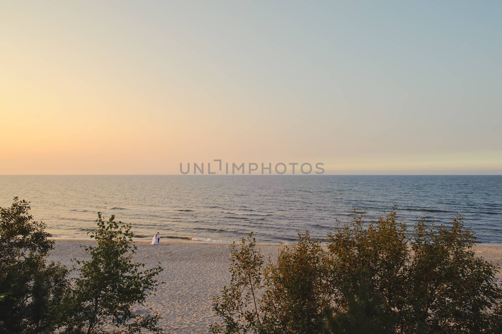 Baltic sea at beautiful sunrise in Poland beach.